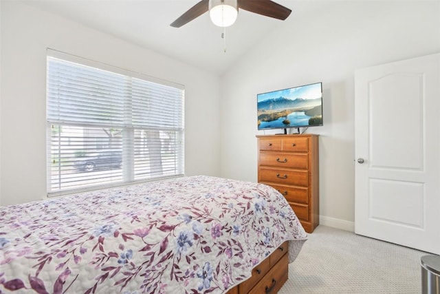 161 Caraway, Kyle, TX 78640 - bedroom with light colored carpet, vaulted ceiling, a ceiling fan, and baseboards