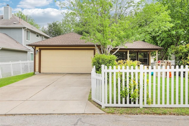 161 Caraway, Kyle, TX 78640 - view of front of house with an attached garage and a shingled roof