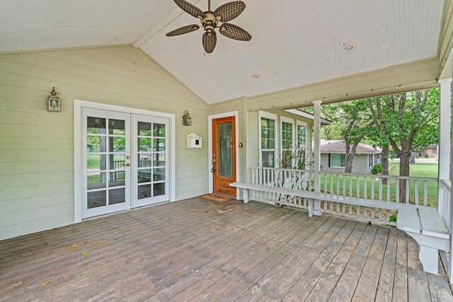 wooden terrace with ceiling fan and french doors