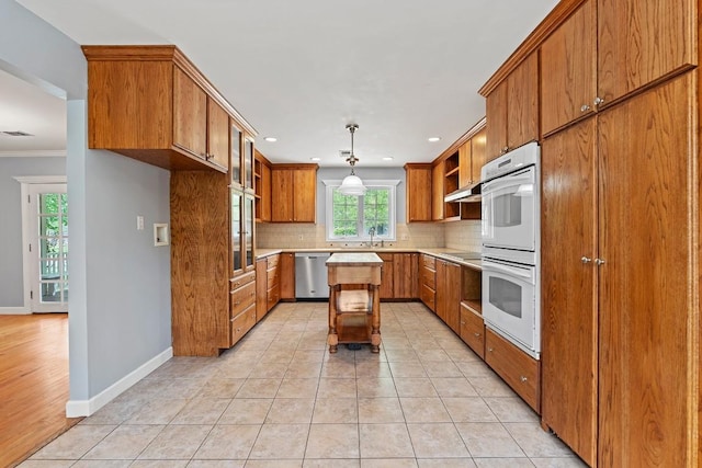 kitchen featuring open shelves, brown cabinetry, dishwasher, and white double oven