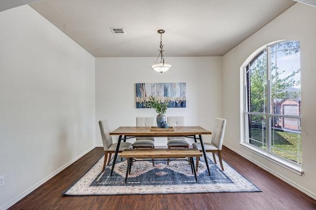4001 Veiled Falls Dr, Pflugerville, TX 78660 - dining room with wood finished floors and baseboards