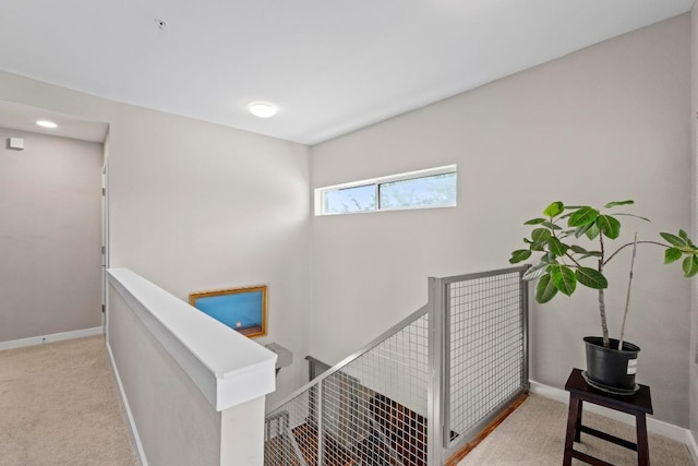 503 Swanee Dr Unit 11, Austin, TX 78752 - stairway featuring baseboards and carpet flooring