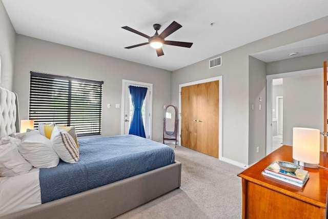 503 Swanee Dr Unit 11, Austin, TX 78752 - bedroom featuring carpet floors and a ceiling fan