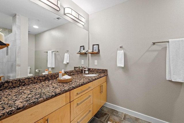 503 Swanee Dr Unit 11, Austin, TX 78752 - bathroom featuring vanity and a shower