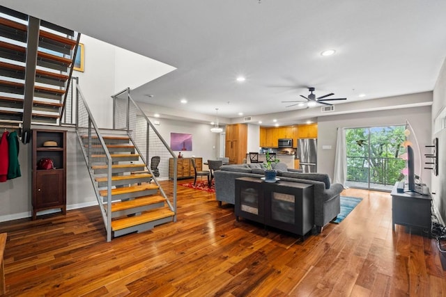 503 Swanee Dr Unit 11, Austin, TX 78752 - living area with hardwood / wood-style flooring, stairs, recessed lighting, and a ceiling fan