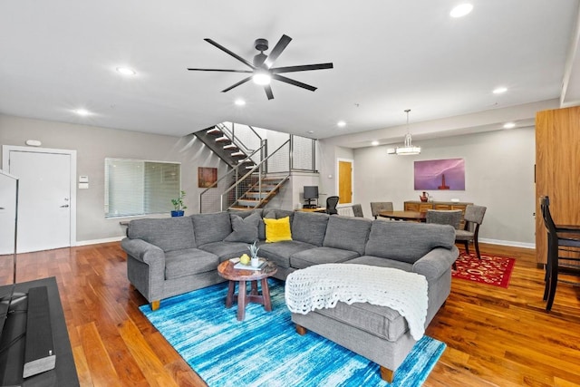 503 Swanee Dr Unit 11, Austin, TX 78752 - living area featuring stairs, wood finished floors, recessed lighting, and ceiling fan