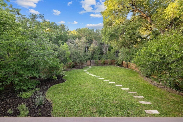 view of yard with fence