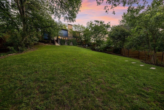 yard at dusk with fence