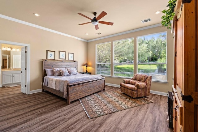 135 N Tumbleweed Trl, Austin, TX 78733 - bedroom featuring crown molding, wood finished floors, multiple windows, recessed lighting, and ensuite bath
