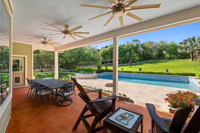 135 N Tumbleweed Trl, Austin, TX 78733 - view of patio with ceiling fan, a pool with connected hot tub, outdoor dining space, and view of scattered trees