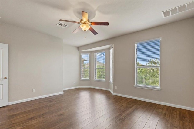 2604 Outlook Ridge Loop, Leander, TX 78641 - unfurnished room featuring a ceiling fan, baseboards, and dark wood finished floors