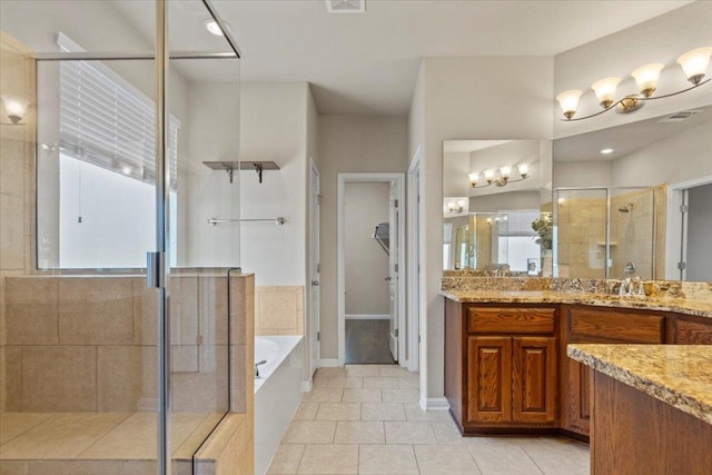 2604 Outlook Ridge Loop, Leander, TX 78641 - full bathroom with a shower stall, a garden tub, tile patterned floors, and vanity