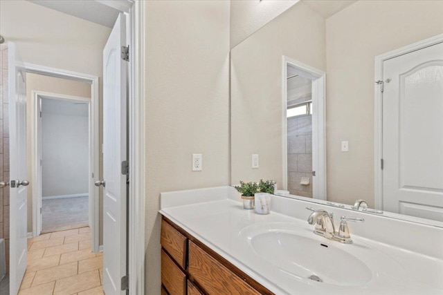 2604 Outlook Ridge Loop, Leander, TX 78641 - bathroom featuring vanity and tile patterned flooring