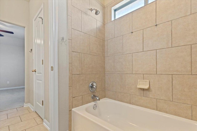 2604 Outlook Ridge Loop, Leander, TX 78641 - bathroom featuring baseboards, bathtub / shower combination, and tile patterned floors