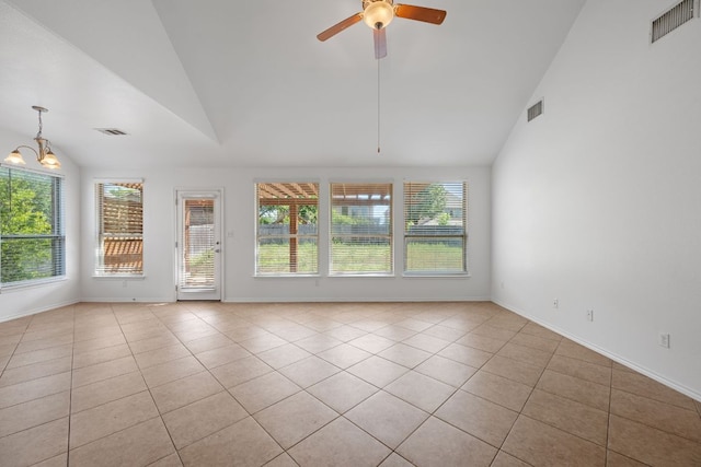 188 Rock Vista Run, Austin, TX 78737 - unfurnished room featuring healthy amount of natural light, light tile patterned floors, ceiling fan, baseboards, and high vaulted ceiling