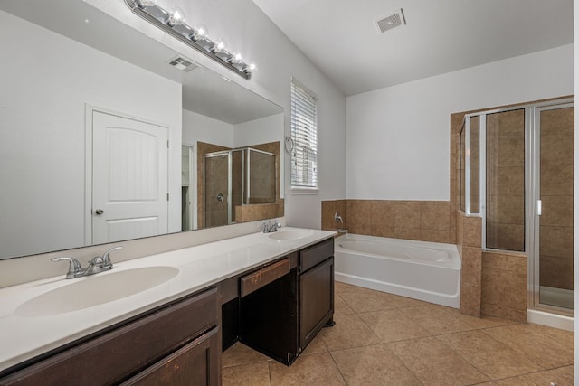 188 Rock Vista Run, Austin, TX 78737 - bathroom with a shower stall, tile patterned floors, a bath, and double vanity