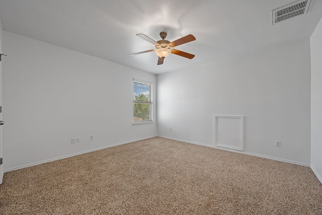 188 Rock Vista Run, Austin, TX 78737 - spare room featuring carpet floors, a ceiling fan, and baseboards