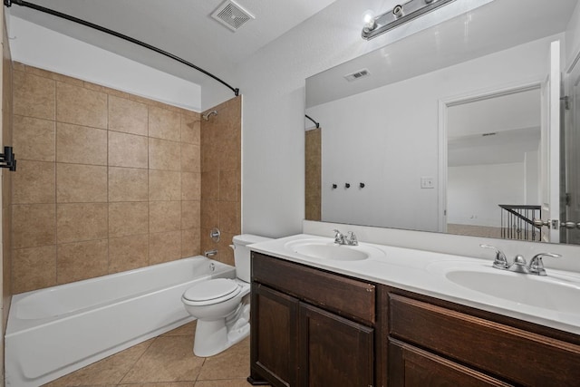 188 Rock Vista Run, Austin, TX 78737 - bathroom featuring double vanity, shower / bathtub combination, toilet, and tile patterned flooring