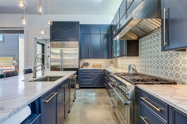 kitchen with blue cabinets, under cabinet range hood, a sink, and double oven range
