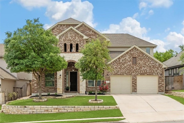 2216 Lookout Knoll Dr, Leander, TX 78641 - view of front of property with concrete driveway, a garage, and brick siding