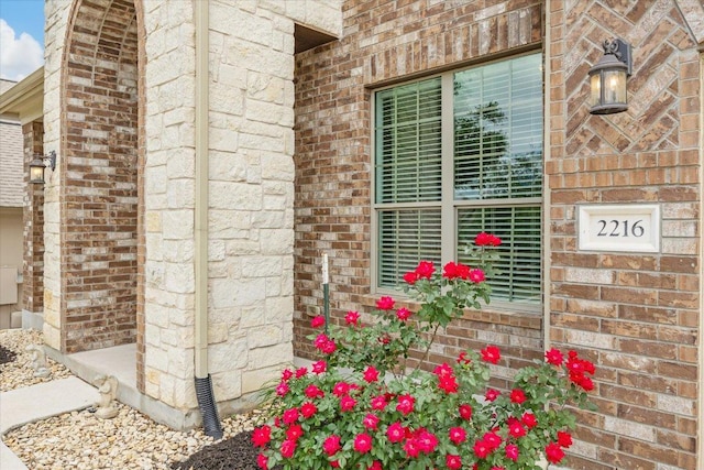 2216 Lookout Knoll Dr, Leander, TX 78641 - doorway to property with brick siding
