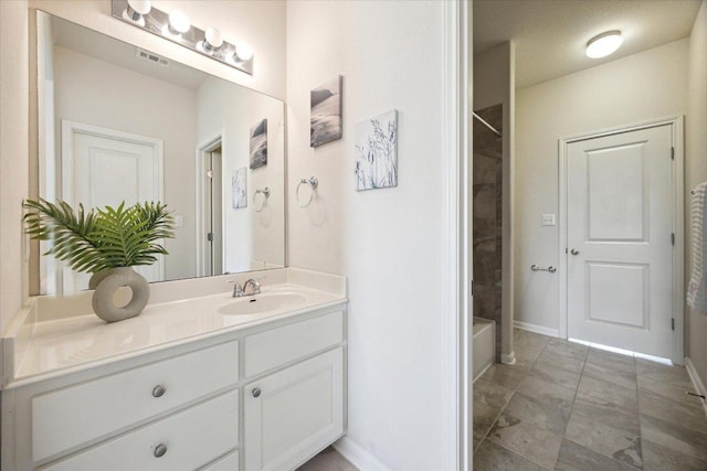 2216 Lookout Knoll Dr, Leander, TX 78641 - bathroom featuring vanity,  shower combination, and baseboards
