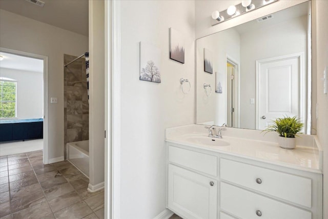 2216 Lookout Knoll Dr, Leander, TX 78641 - bathroom featuring vanity, shower / tub combination, and baseboards