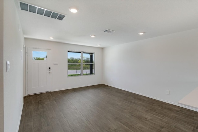 175 Safflower Dr, Uhland, TX 78640 - foyer featuring dark wood finished floors and recessed lighting