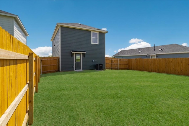 175 Safflower Dr, Uhland, TX 78640 - rear view of property with a fenced backyard