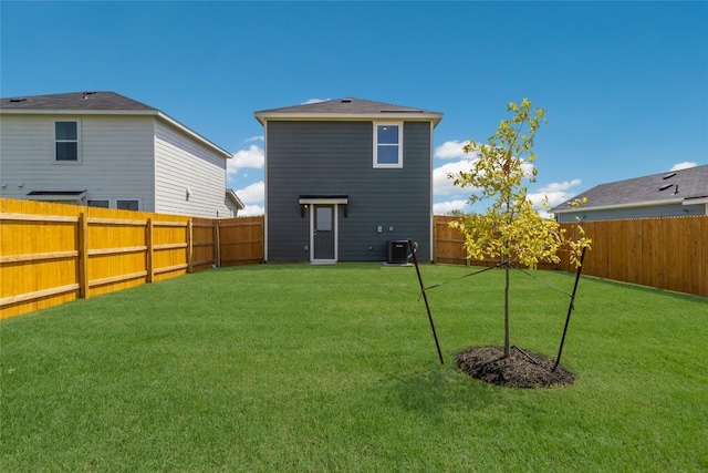 175 Safflower Dr, Uhland, TX 78640 - rear view of property featuring a fenced backyard