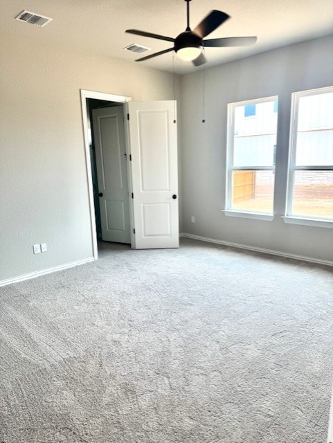 1155 Roger Hanks Pkwy, Dripping Springs, TX 78620 - unfurnished bedroom with carpet and ceiling fan