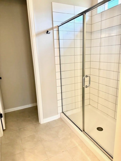 1155 Roger Hanks Pkwy, Dripping Springs, TX 78620 - bathroom featuring a shower stall and tile patterned flooring