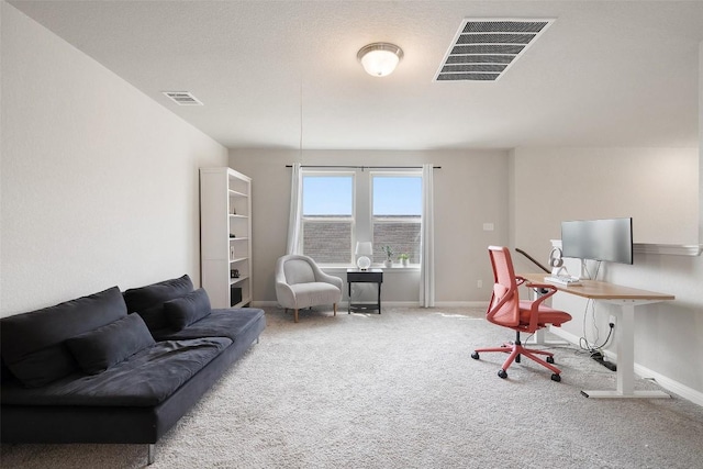 carpeted office with baseboards