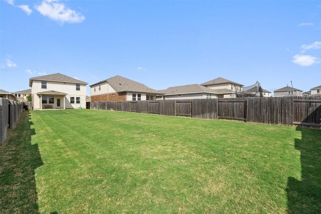 view of yard featuring a residential view