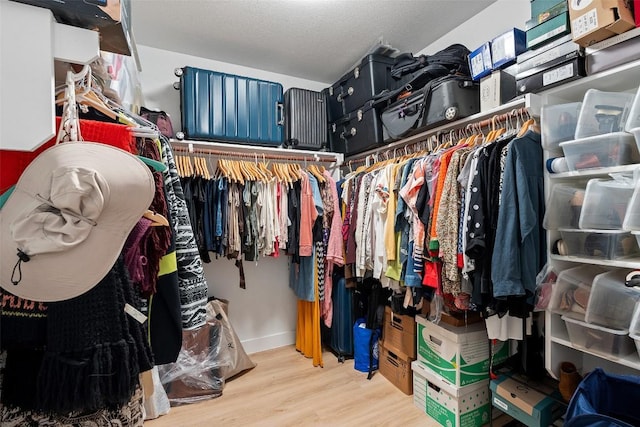 11604 Gaelic Dr, Austin, TX 78754 - spacious closet with wood finished floors