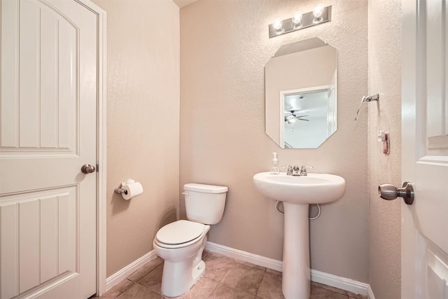 1432 Blake St, Leander, TX 78641 - bathroom with ceiling fan and tile patterned floors