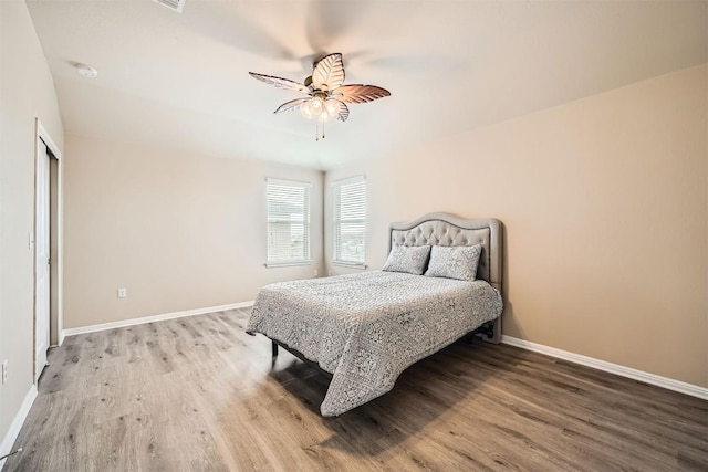 1432 Blake St, Leander, TX 78641 - bedroom with wood finished floors, baseboards, and ceiling fan