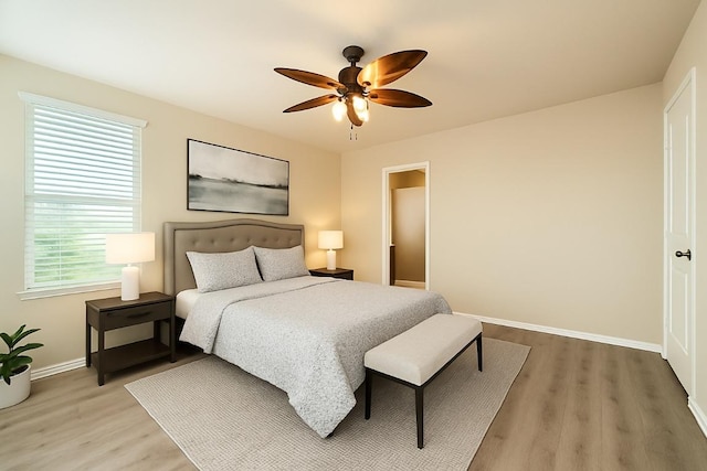 1432 Blake St, Leander, TX 78641 - bedroom with light wood-style floors, baseboards, and a ceiling fan