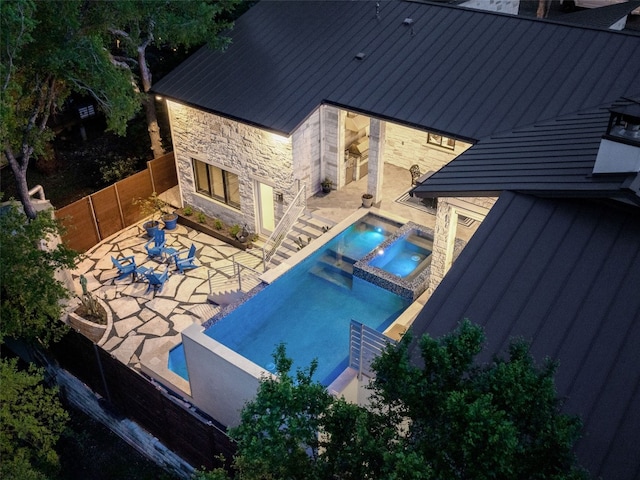 9806 Inca Ln, Austin, TX 78733 - view of swimming pool featuring a patio, a fenced backyard, and a pool with connected hot tub
