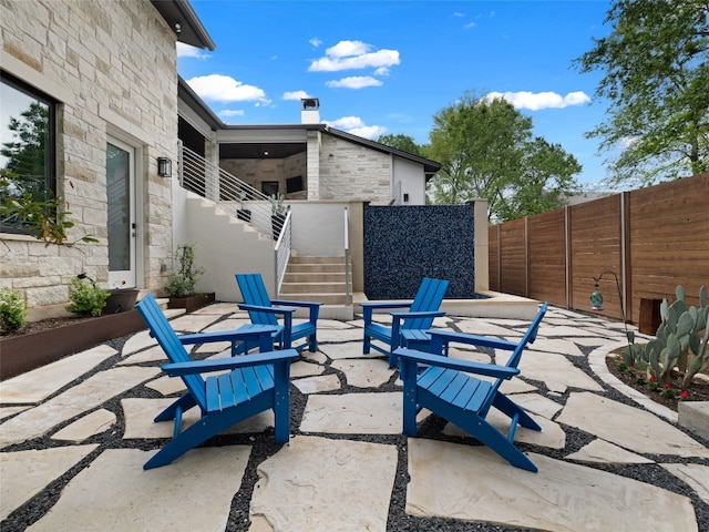 9806 Inca Ln, Austin, TX 78733 - view of patio / terrace with stairs and an outdoor fire pit