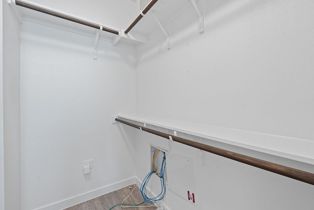 705 N Bluff Dr Unit 14, Austin, TX 78745 - walk in closet featuring wood finished floors