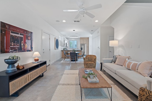 705 N Bluff Dr Unit 14, Austin, TX 78745 - living room featuring finished concrete floors, ceiling fan, and recessed lighting