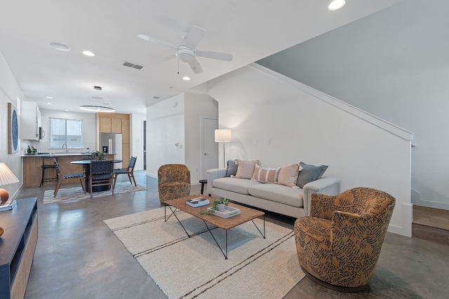 705 N Bluff Dr Unit 14, Austin, TX 78745 - living room with concrete floors, ceiling fan, and recessed lighting