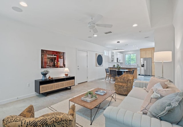 705 N Bluff Dr Unit 14, Austin, TX 78745 - living area with ceiling fan and recessed lighting