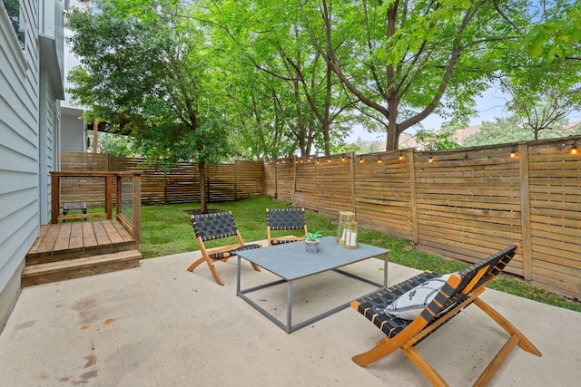 705 N Bluff Dr Unit 14, Austin, TX 78745 - fenced backyard featuring a patio