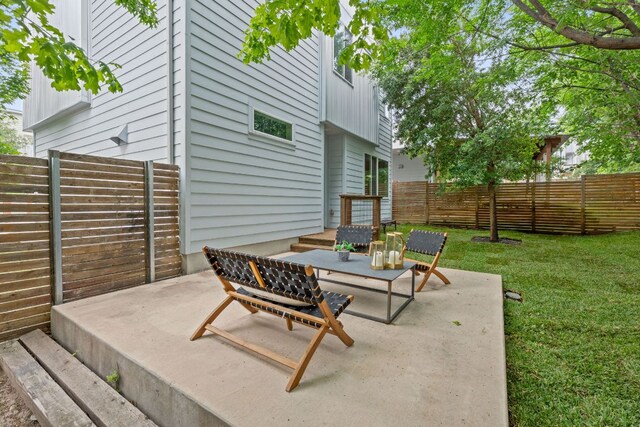 705 N Bluff Dr Unit 14, Austin, TX 78745 - fenced backyard featuring a patio area