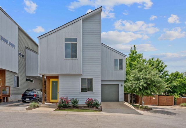 705 N Bluff Dr Unit 14, Austin, TX 78745 - modern home with an attached garage and driveway