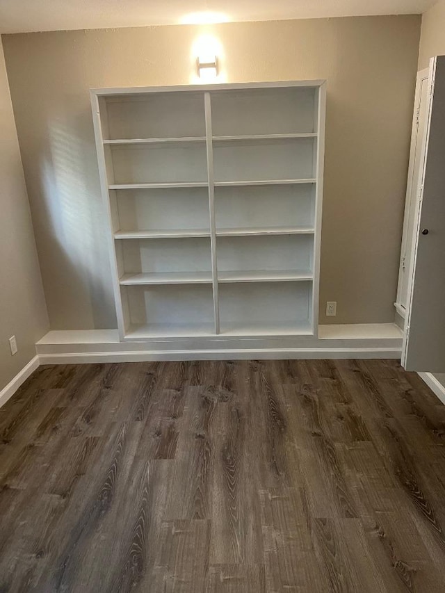 details featuring baseboards and wood finished floors