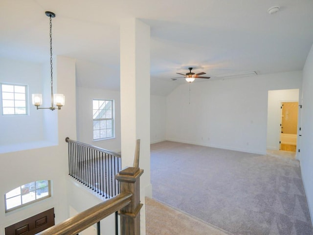 1705 Cayuga St, Leander, TX 78641 - empty room with light carpet, healthy amount of natural light, ceiling fan, and a smoke detector