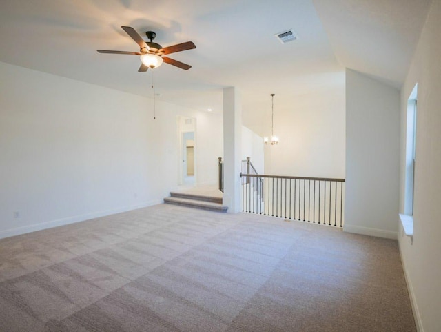 1705 Cayuga St, Leander, TX 78641 - empty room with carpet flooring, ceiling fan, a chandelier, and lofted ceiling